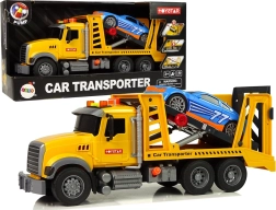 Žlté odťahové vozidlo s rampou so svetlami a zvukmi