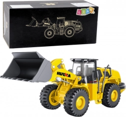 Kovový model nakladača HUINA 1:50 žltý