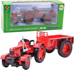 Kovový červený traktor s prívesom 1:18
