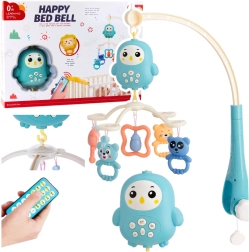 Hudobný kolotoč nad postieľku s lampičkou a hrkálkami – modrý