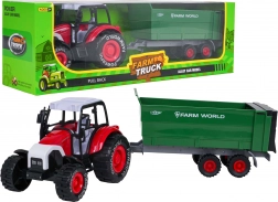 Kovový traktor s odpojiteľným prívesom na zotrvačník