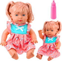 Bábka bábätko vo farebných šatách s fľašou a zvukmi