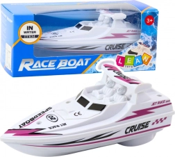 Biela motorová loďka na batérie