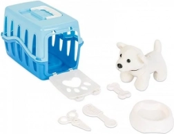 Psík v modrom prepravnom boxe