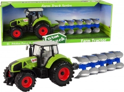 Traktor s pluhom na zotrvačník