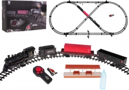 Vláčkodráha s dymiaciou lokomotívou so svetlom a hudbou