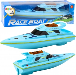 Modrá motorová loďka na batérie