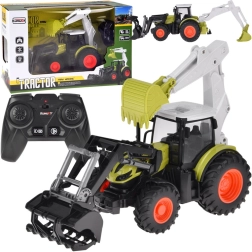 Diaľkovo ovládaný traktor s bagrom a nakladačom