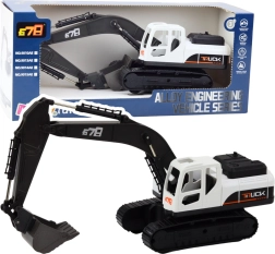 Veľké pásové rýpadlo s kovovou lyžicou a pohyblivými kĺbmi