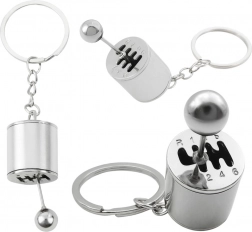 Kovový prívesok na kľúče v tvare radiacej prevodovky, strieborný