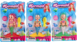 Morská víla s dlhými vlasmi a lesklými šatami