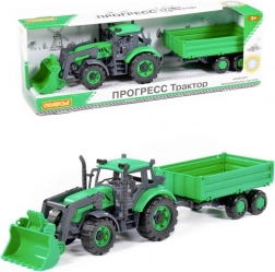 Traktor s prívesom a nakladačom Progress