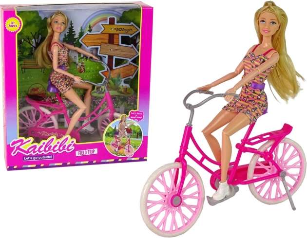 Bábika na ružovom bicykli