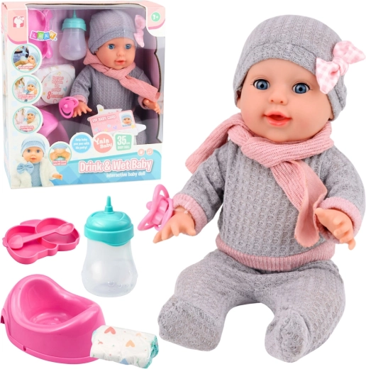 Interaktívna cikaťaca bábika 35 cm s doplnkami – fľaša a nočník