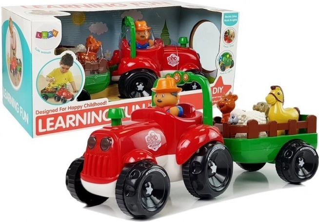 Hudobný traktor s prívesom a zvieratkami na batérie