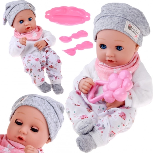 Bábika bábätko 32 cm s pohyblivými viečkami a sadou na kŕmenie