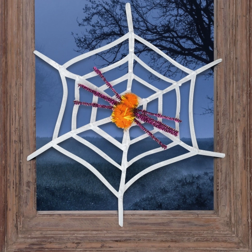 Biela halloweenska pavučina so žltým pavúkom