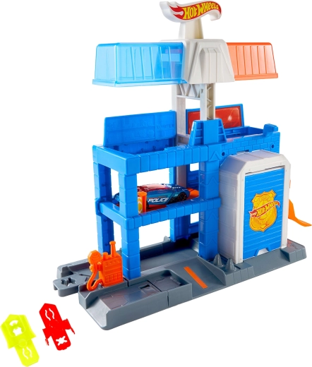 Kovové policajné vozidlo 1:64 súčasťou