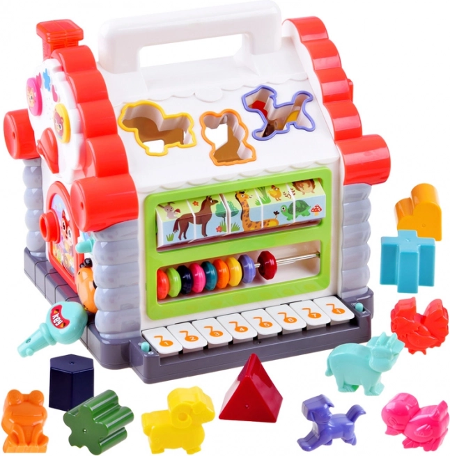 Interaktívny domček – hudobná triedička tvarov a zvieratiek pre deti 18+ mesiacov