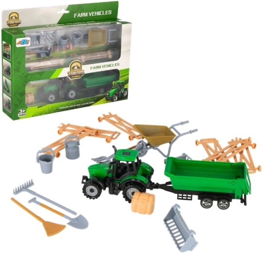 Traktor s prívesom a farmárskym príslušenstvom