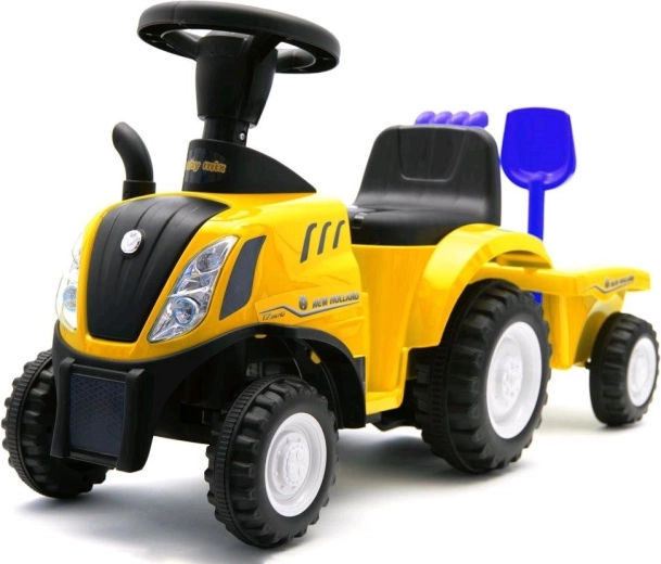 Detské odrážadlo traktor s vlečkou a náradím New Holland – žlté