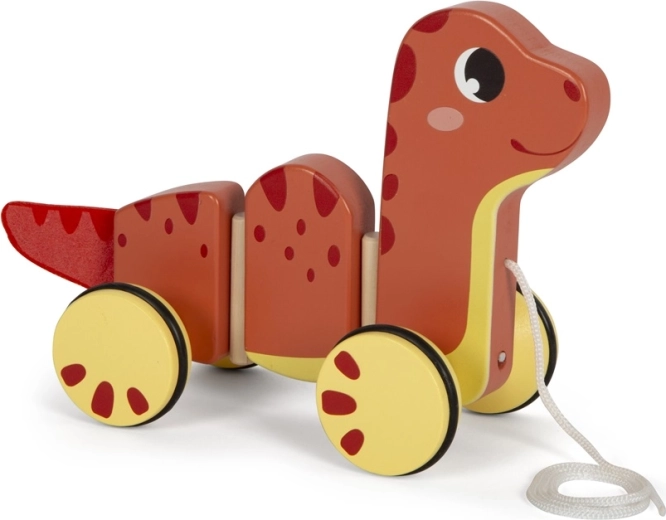 Malý drevený ťahací dinosaurus