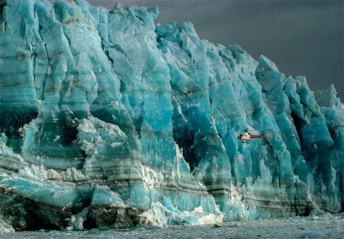 CLEMENTONI Puzzle National Geographic: Vrtuľník skúma stenu Hubbardovho ľadovca 1000 dielikov