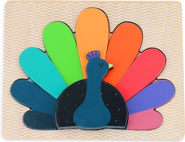 Drevená vkladacia puzzle Páv od Vilac