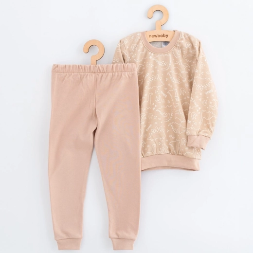 Detské bavlnené pyžamo NEW BABY béžové s dinom