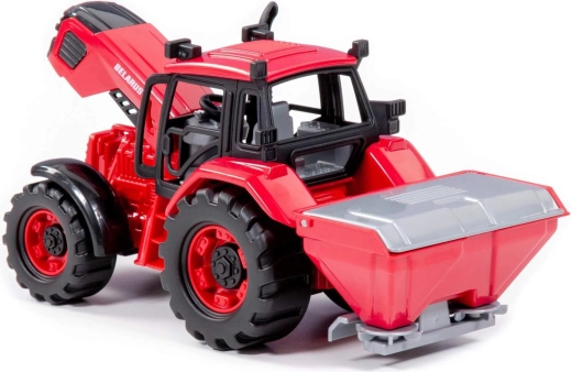 Traktor s prívesom na hnojenie