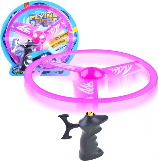 Lietajúci disk s vystreľovačom a svetelným efektom – Ružová