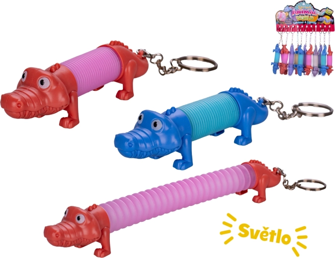 Naťahovací prívesok na kľúče krokodíl so svetlom