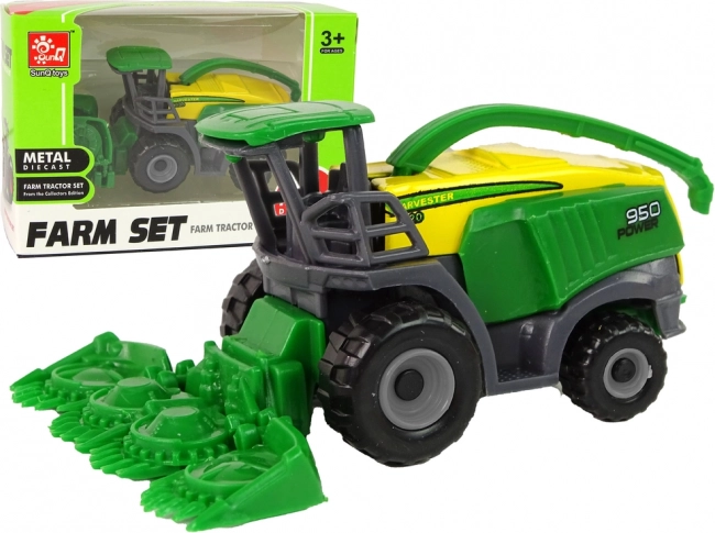 Zelený malý poľnohospodársky kombajn – hračka