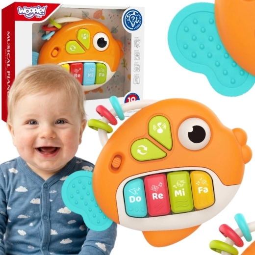Woopie Baby interaktívna klavírna rybka so zvukmi a svetlom 18 m+