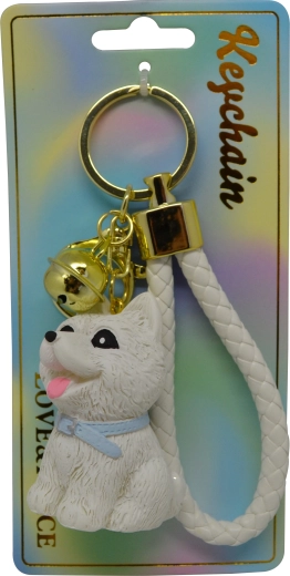 Prívesok na kľúče so sediacim bielym psom