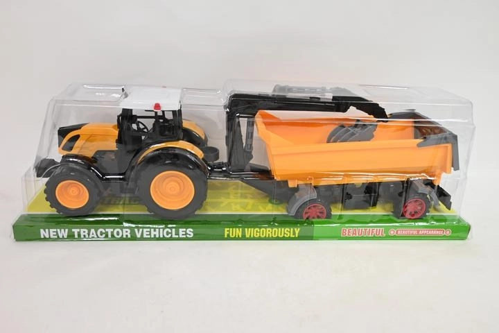 Traktor s prívesom a nakladacím drapákom