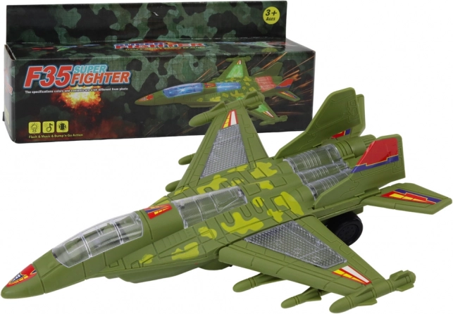 Vojenská stíhačka so svetlami a zvukmi – zelená