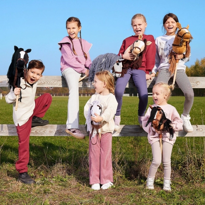 Kôň na tyči Hobby Horse HOPPIHORSE tmavohnedý