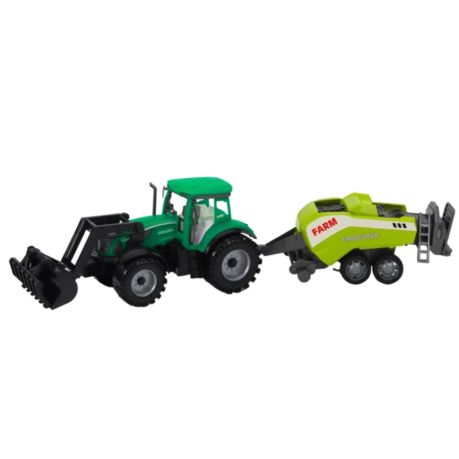 Zelený traktor s nakladačom a kompatibilným lisom na balíky