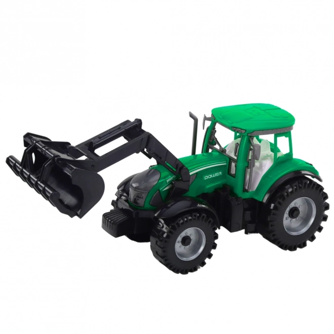 Zelený traktor s nakladačom a kompatibilným lisom na balíky