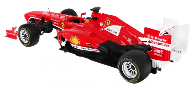 Ferrari F138 Rastar model 1:12 z diaľkovým ovládaním + pilot 2,4 GHz