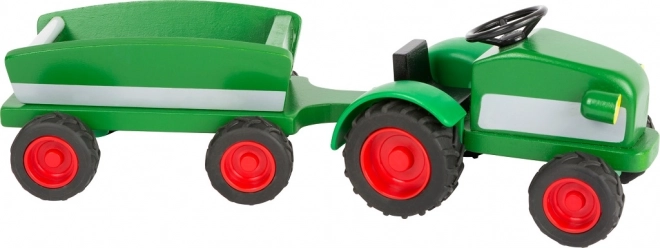 Drevený traktor s vlečkou zelený