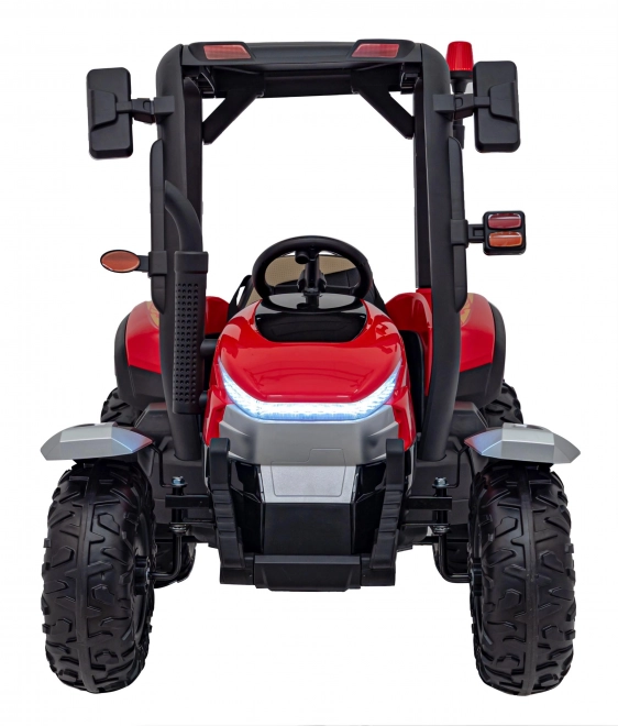 Traktor s prívesom červený