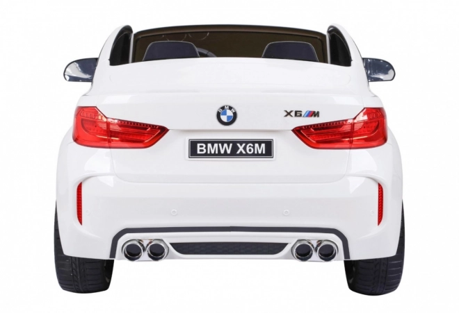 BMW X6M XXL pro 2 deti Biela + diaľkové ovládanie + eko koža + bezpečnostné pásy + pomalý rozjazd + MP3 USB + LED