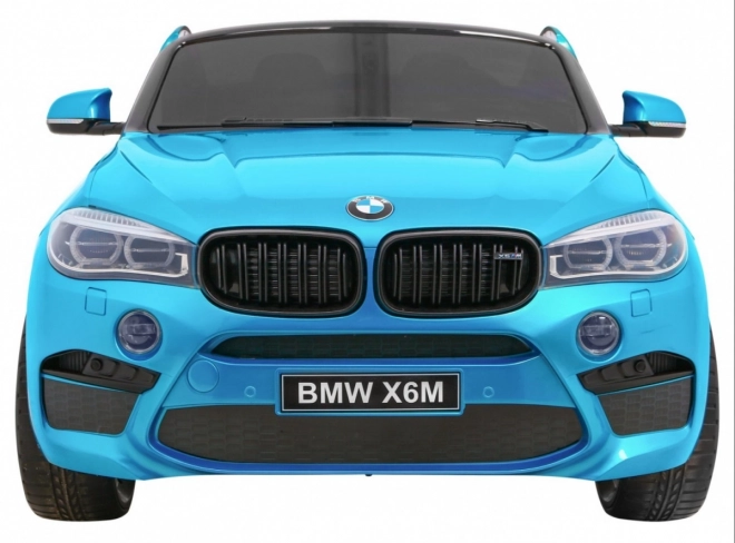 BMW X6M XXL pro 2 deti Modrá farba + Pilot + Eco koža + Bezpečnostné pásy + Pomalý štart + MP3 + LED