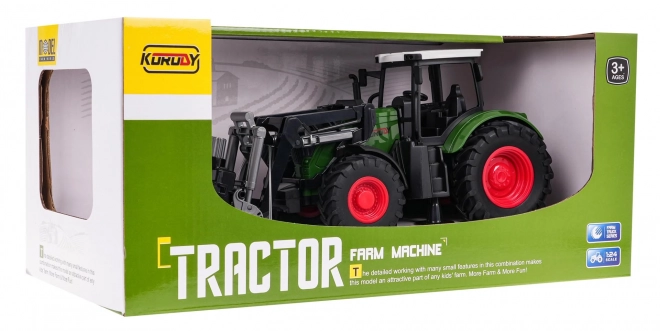 Zelený traktor s chvatačom