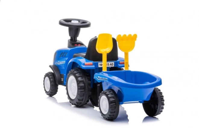 Odrážadlo traktor New Holland modrý