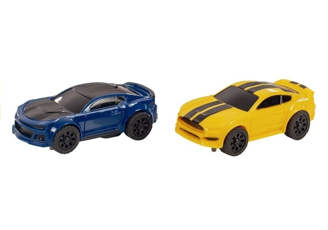 Dve športové autá v mierke 1:64