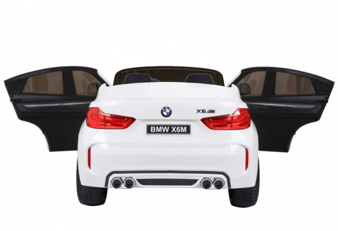 BMW X6M XXL pro 2 deti Biela + diaľkové ovládanie + eko koža + bezpečnostné pásy + pomalý rozjazd + MP3 USB + LED