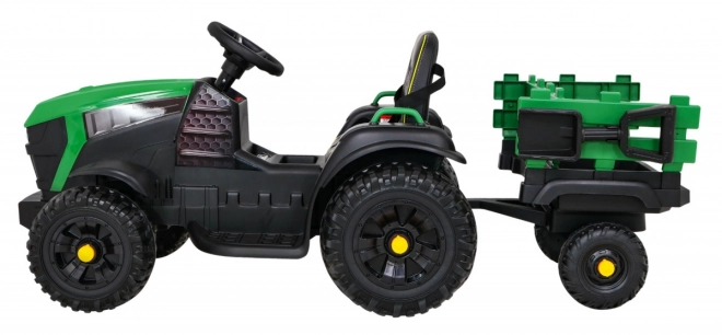 Titanový traktor s prívesom zelený